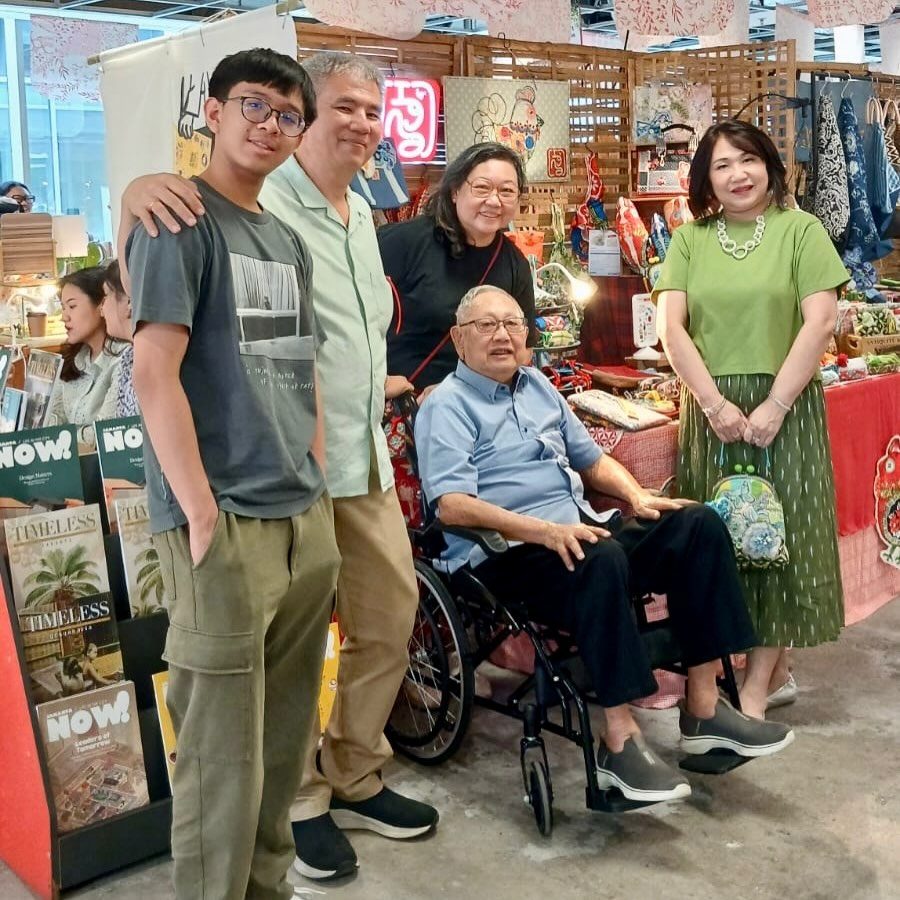 Igna with her family at her Lokal Indonesia market booth